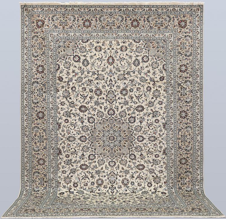 A Keshan carpet, approx. 355 x 250 cm.