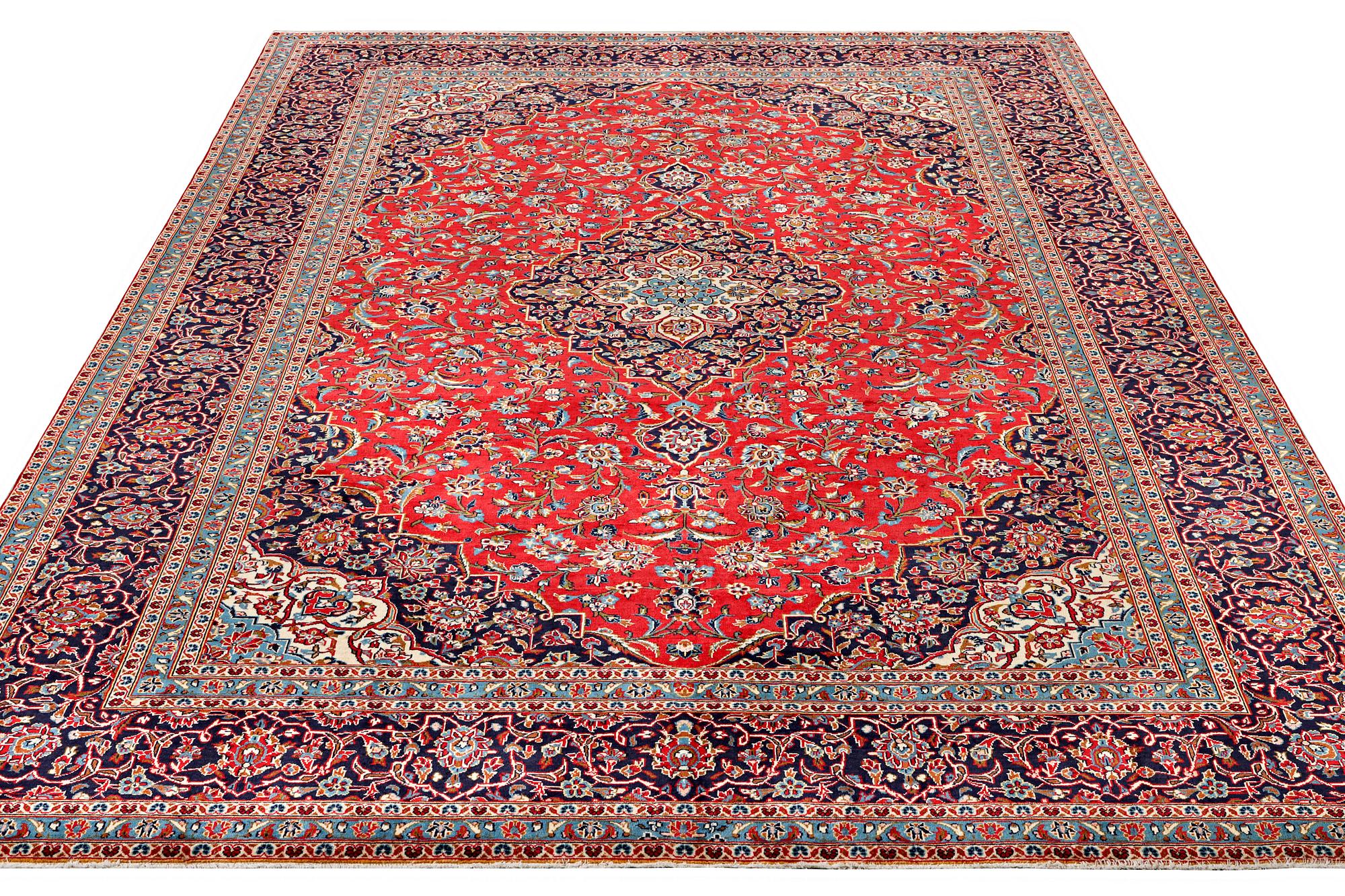 A Kashan carpet, c. 403 x 292 cm.