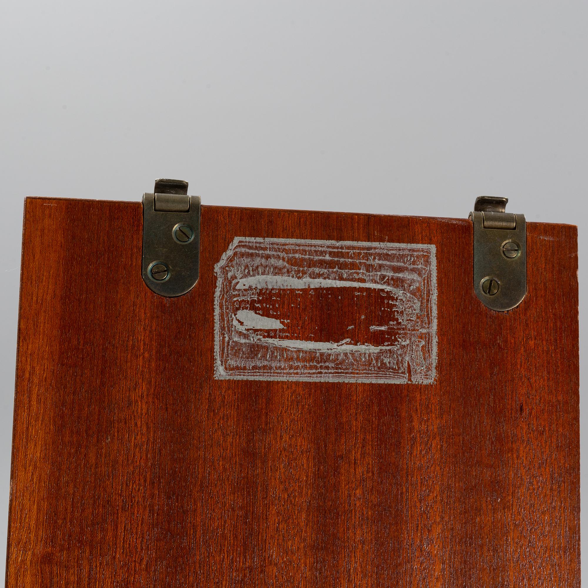 A 'String" bookcase, designed by  Nils Strinning,