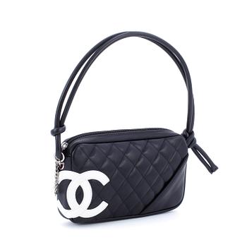 592. CHANEL, handväska / Pochette.