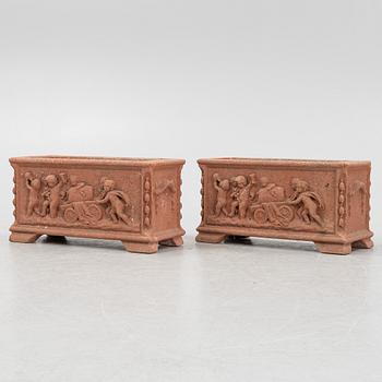 A pair of terracotta garden pots, 20th/21st Century.