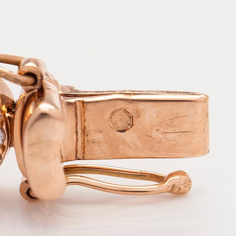 A multi colour sapphire and diamond bracelet in 14K rosegold.