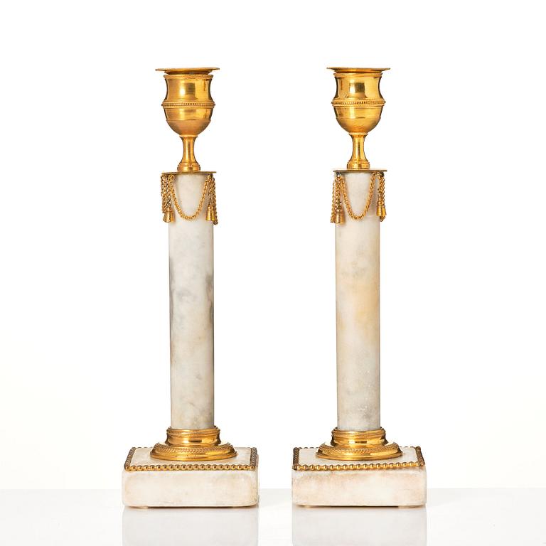 A pair of late Gustavian candlesticks.