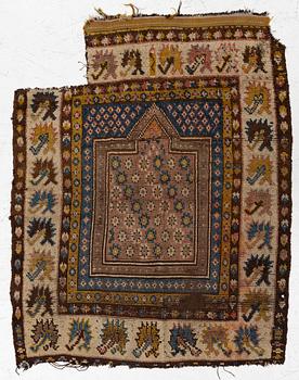An antique Monastir prayer rug fragment , Ottoman Empire, c 133 x 106 cm.