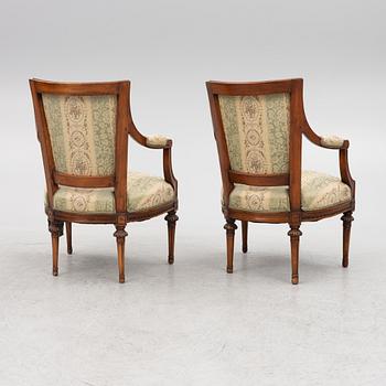 A pair of late Gustavian open armchairs, Stockholm, late 18th century.
