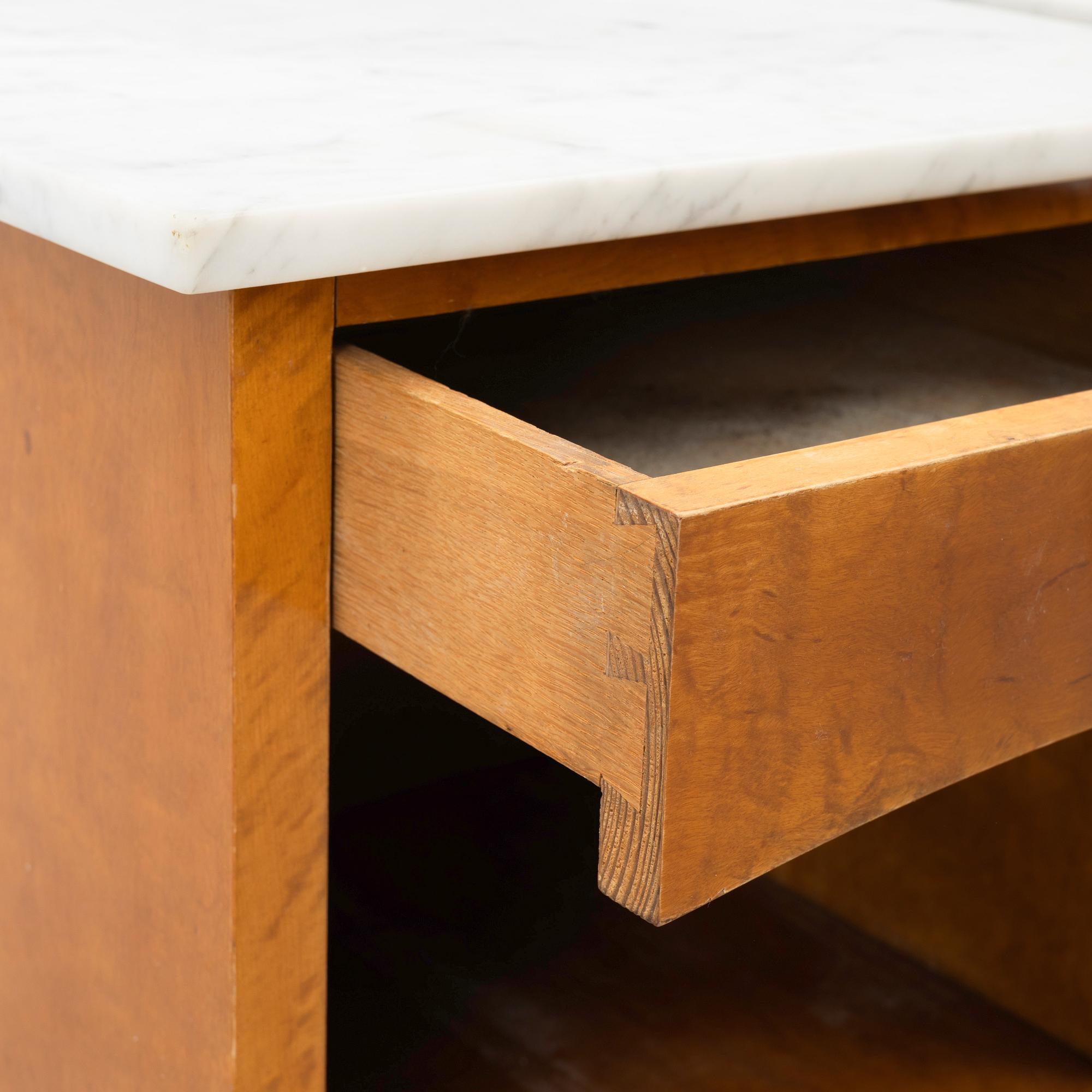 A pair of early 20th century bedside tables.