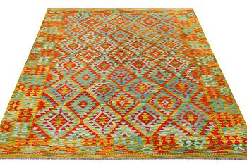 An Afghan Kelim carpet, c. 244 x 206 cm.