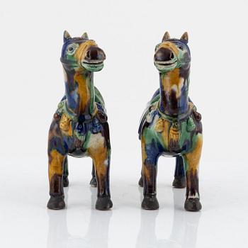 A pair of ceramic horse figurines, China, 20th century.