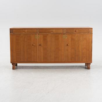 Carl Malmsten, a 'Klinte' walnut veneered sideboard, Åfors Möbelfabrik.