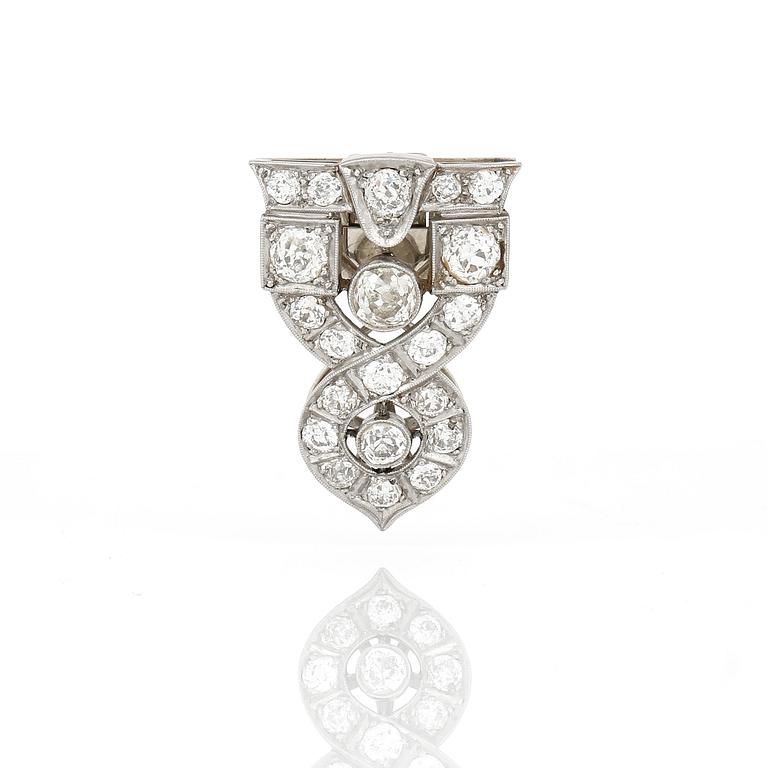 CLIPP/BROSCH, 14K vitguld med gammalslipade diamanter, tot ca 2,87 ct, Nederländerna, 1906-1953. Total vikt ca 8,48 g.