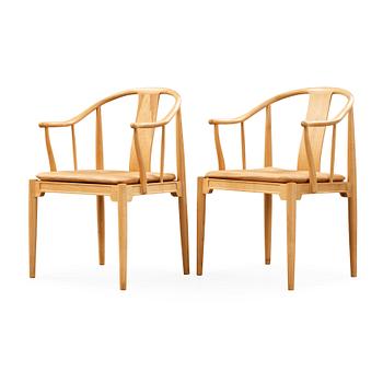 123. A pair of Hans J Wegner 'China chairs', Fritz Hansen, Denmark 1986-87.