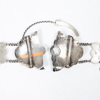 Belt/waistband and two brooches, silver, Russia 1896–1908.