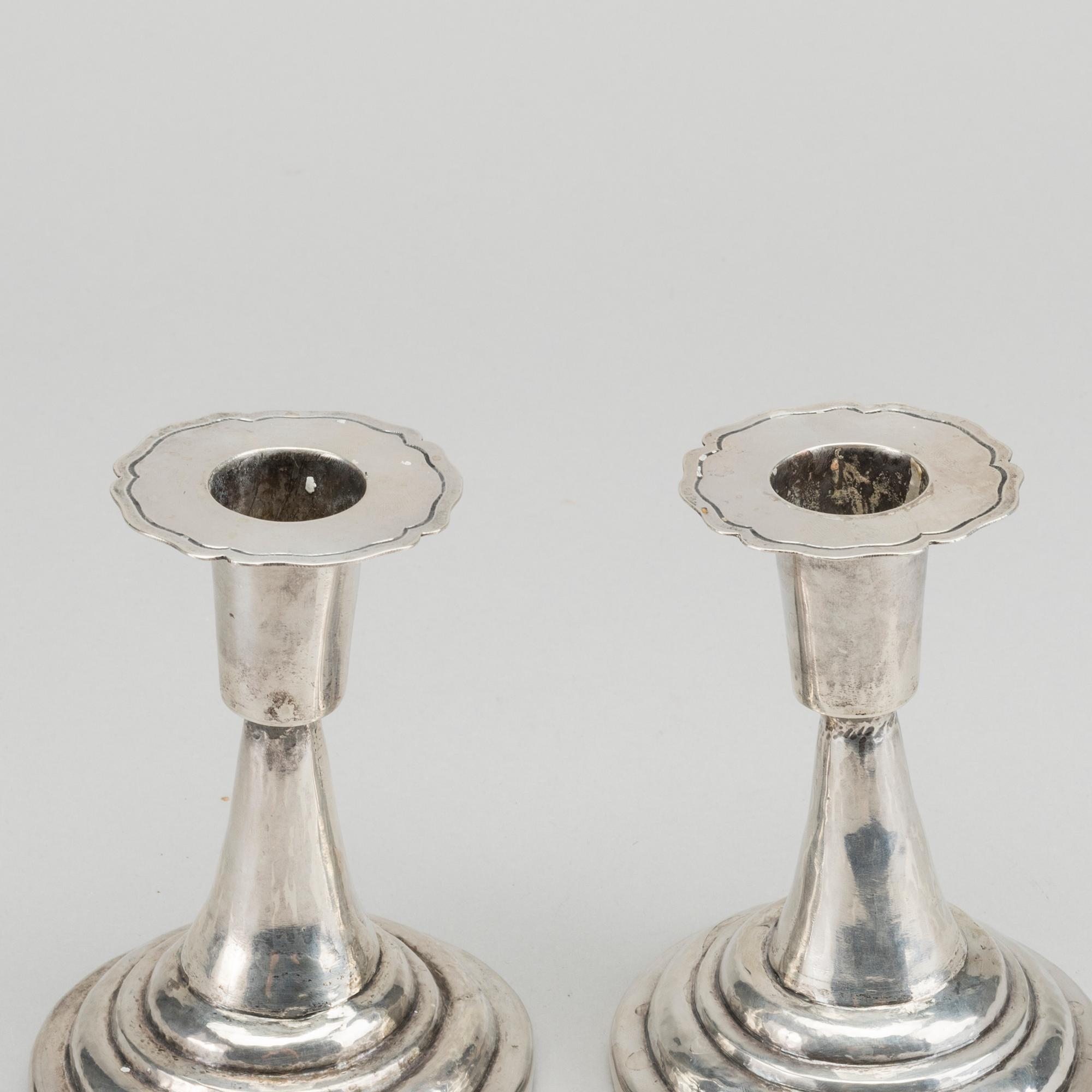 A PAIR OF SILVER CANDLESTICKS SOUTH AMERIKA.