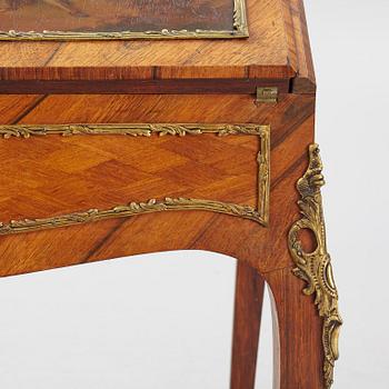 A Louis XV-style secretaire, mid 20th century.