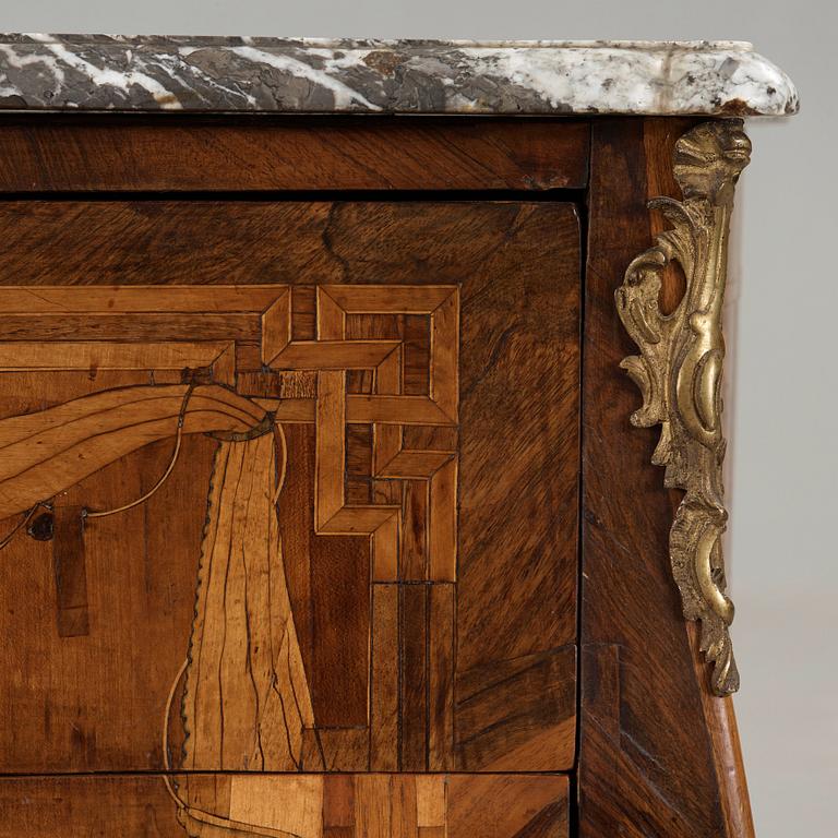 A Louis XV 18th century commode in the manner of Jacques Bircklé, master in Paris 1764.