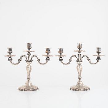 A Pair of Silver Candelabras, Swedish import mark K Anderson, Stockholm 1929.