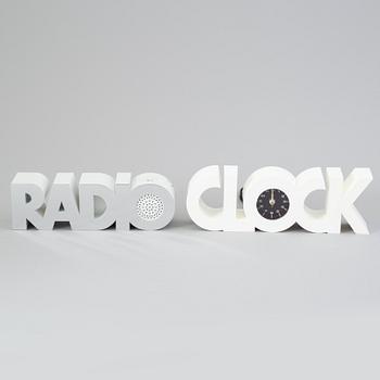 a plastic clock and radio from ISIS, USA, 1980's.