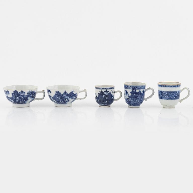 A group of thirteen cups, a bowl and a cup holder, four saucers, partly China and 18th century,