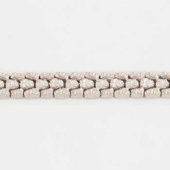 A fancy-link bracelet.