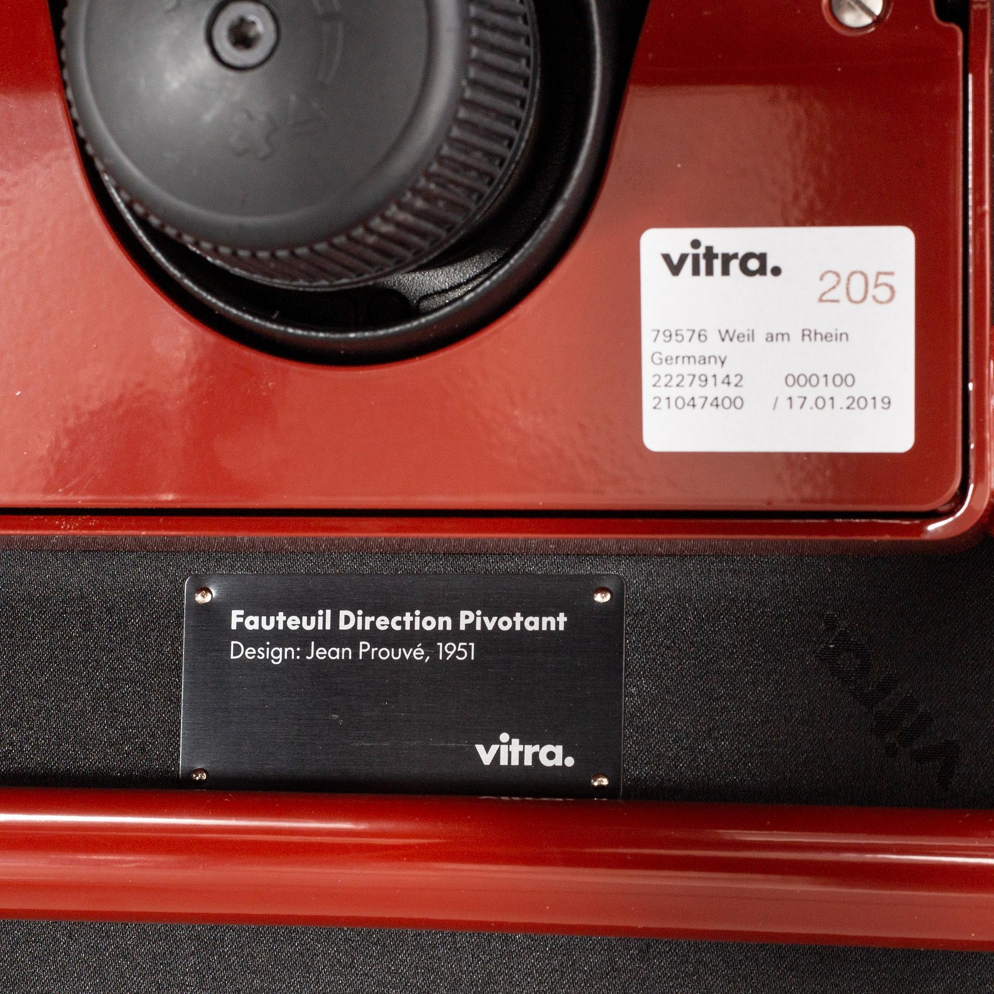 A Fauteuil Direction Pivotan office chair by JEAN PROUVÉ for VITRA.