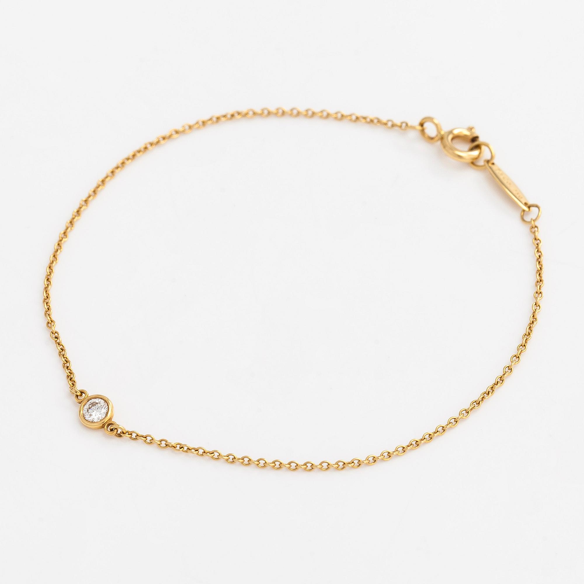 Tiffany & Co, Elsa Peretti, armband, "Diamonds by the Yard", 18K guld med en diamant ca 0.08 ct.