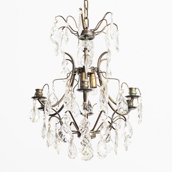 A Rococo.style chandelier, first half of the 20th century.