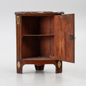 A pair of corner cabinets, Directoire, France, circa 1800.