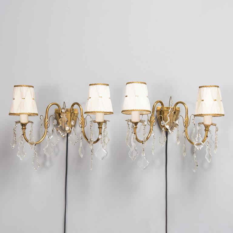 Mauri Almari, a pair of mid-20th-century brass wall sconces for Idman.