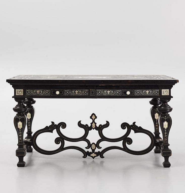 A Renaissance-style ebony, ebonized and ivory-inlaid library table, late 19th century, presumably Germany.