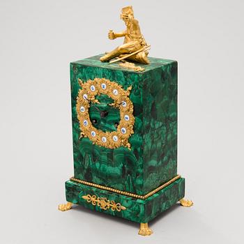 A mid 19th Century French gilt bronze and malachite mantel clock.