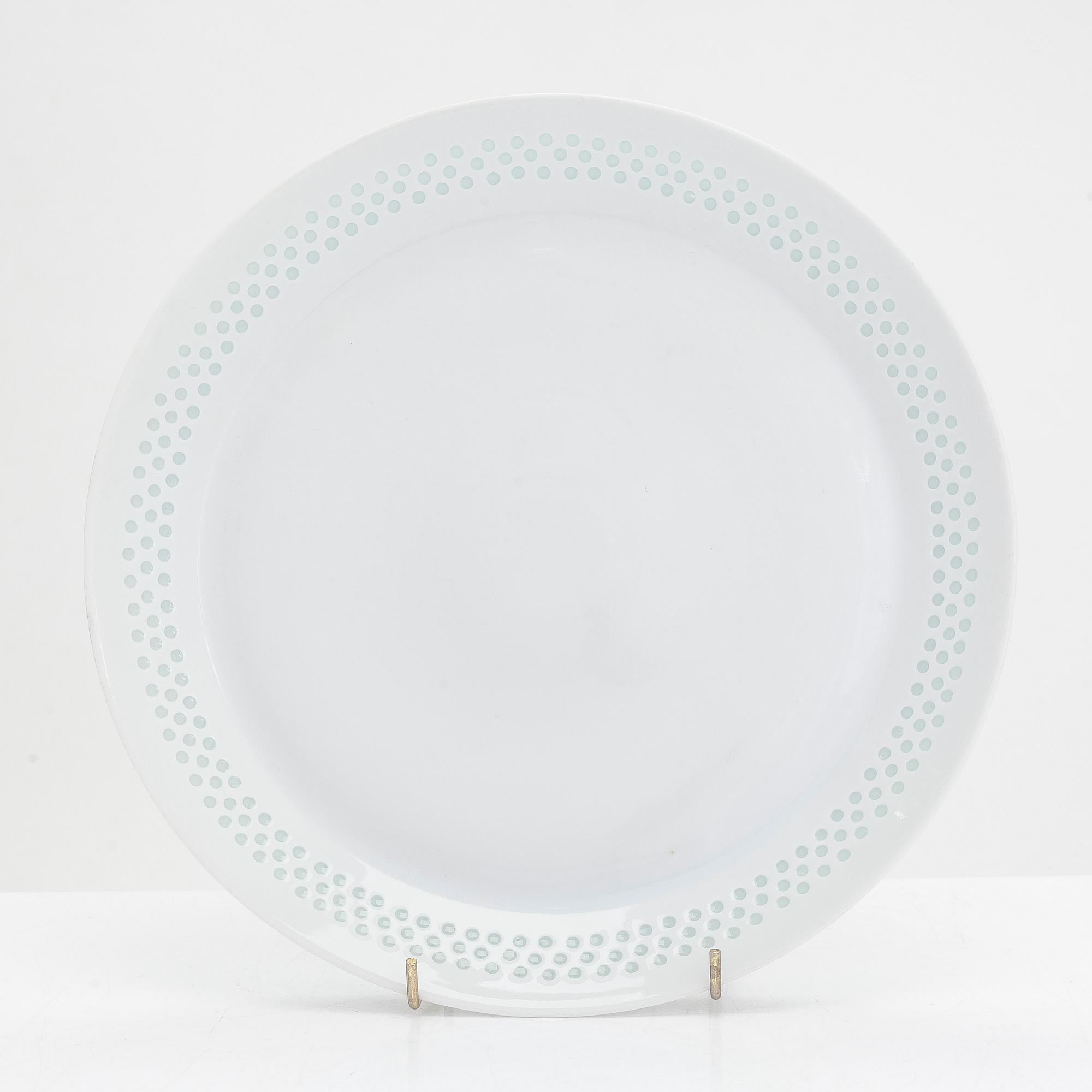 Friedl Holzer-Kjellberg, three porcelain candle holders and a "Helmi" plate, Arabia, 1970s.