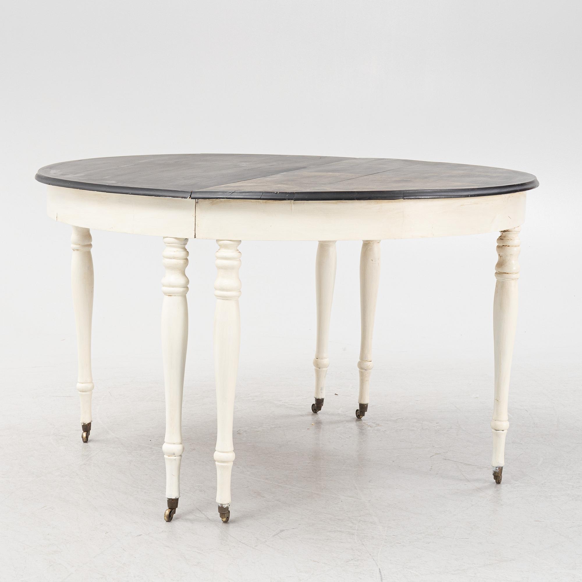 A painted dining table, late 19th Century.