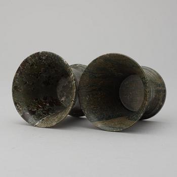 A pair of Swedish green marble beakers.