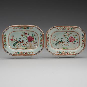 A set of three famille rose 'double peacock' serving dishes, Qing dynasty, Qianlong (1736-95).