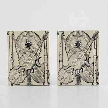 Piero Fornasetti, bookend "Strumenti Musicali", mid-20th century.