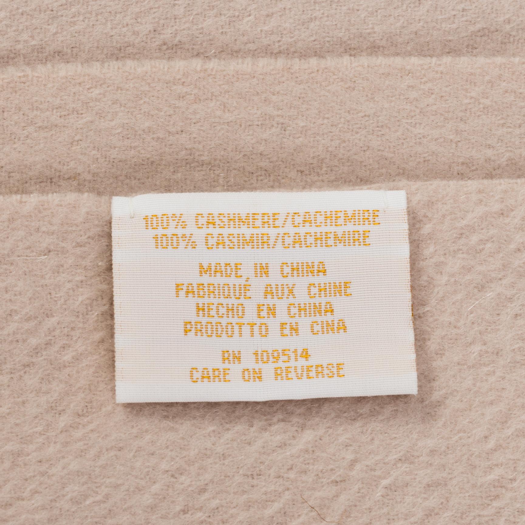 RALPH LAUREN, a cashmere throw.