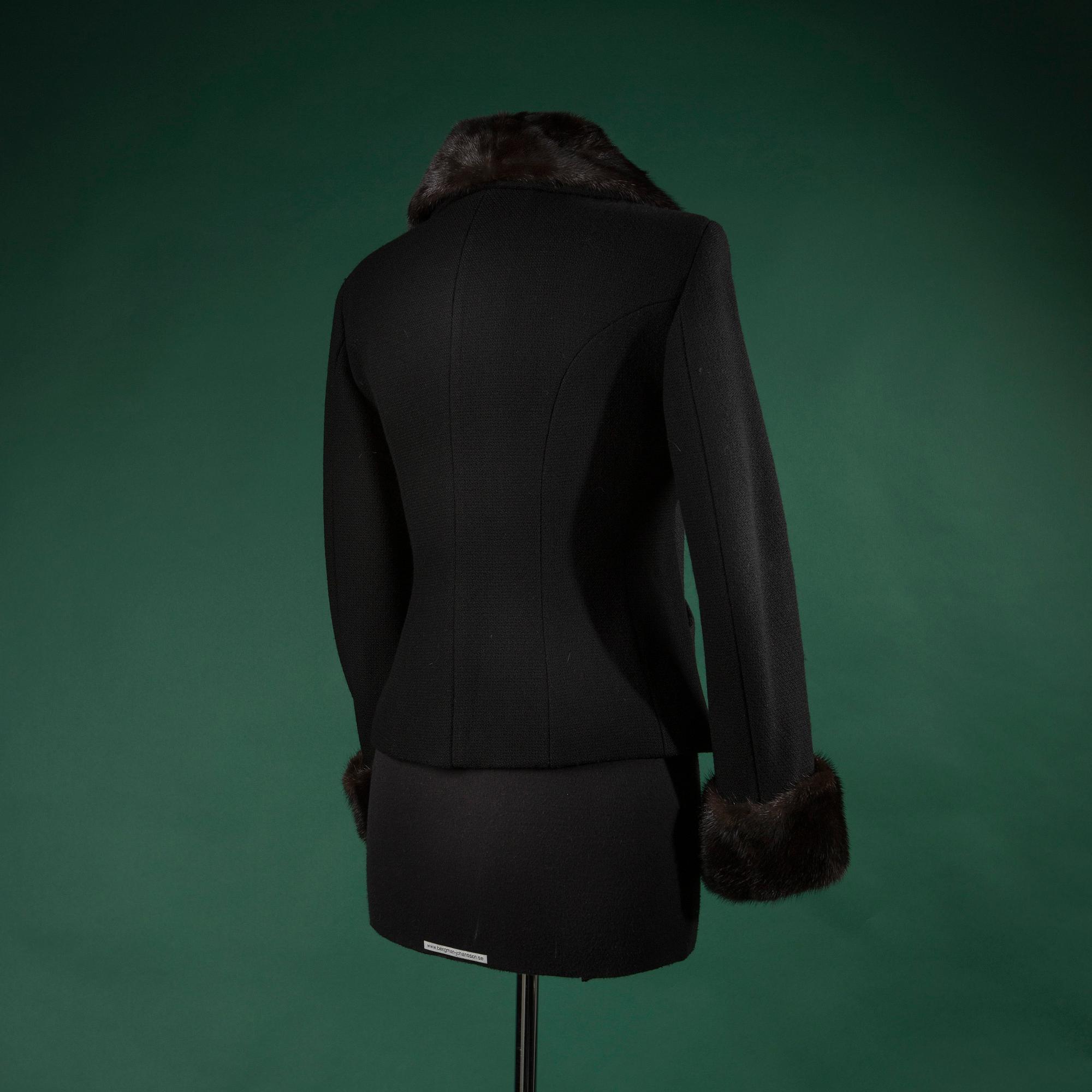 A jacket by MOSCHINO, in size 44(IT).