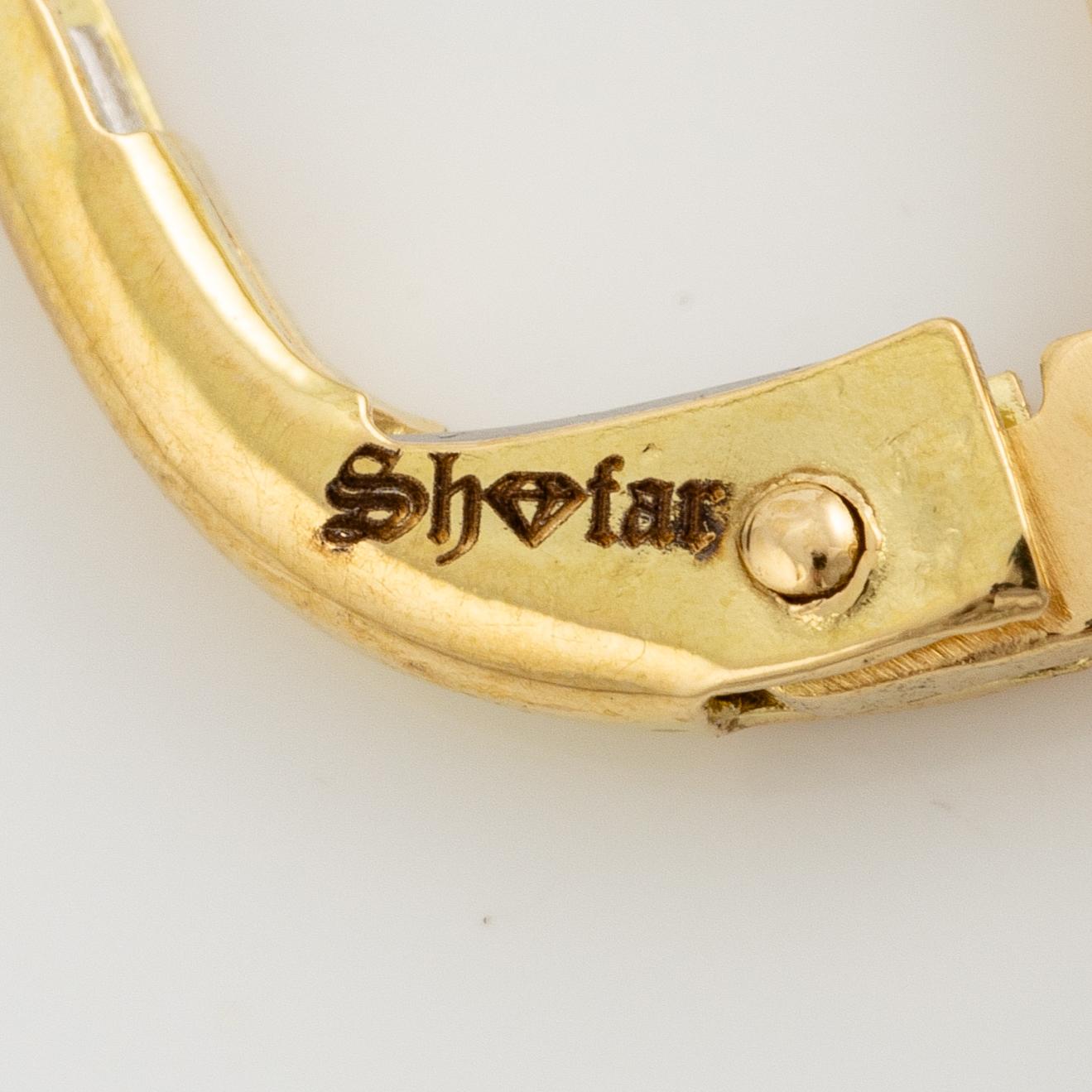 Örhängen 18K guld med safirer och briljantslipade diamanter.