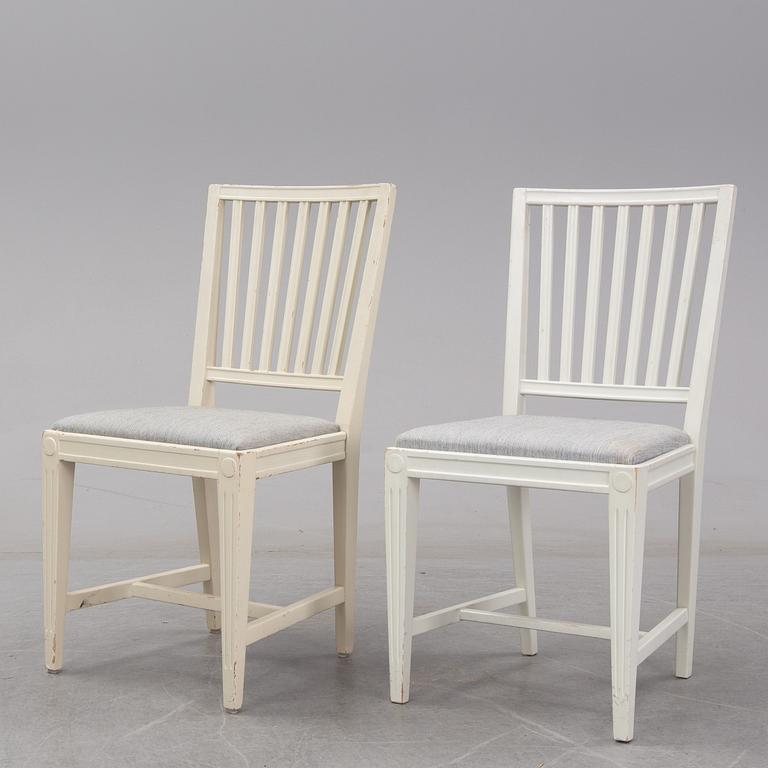 A set of 12 gustavian style chairs from the second half of the 20th century.