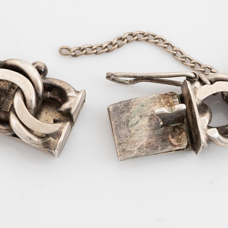 Silver bracelet.