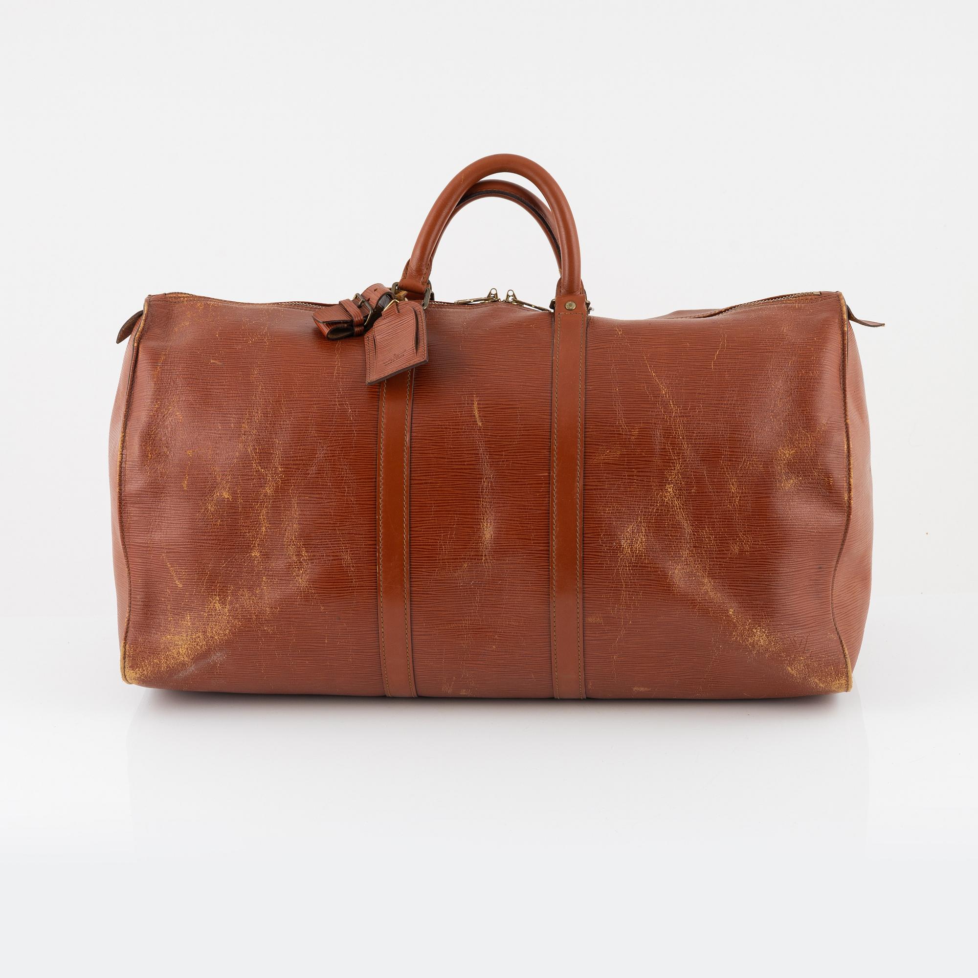 Louis Vuitton, an Epi 'Keepall 55' weekendbag, 1987.