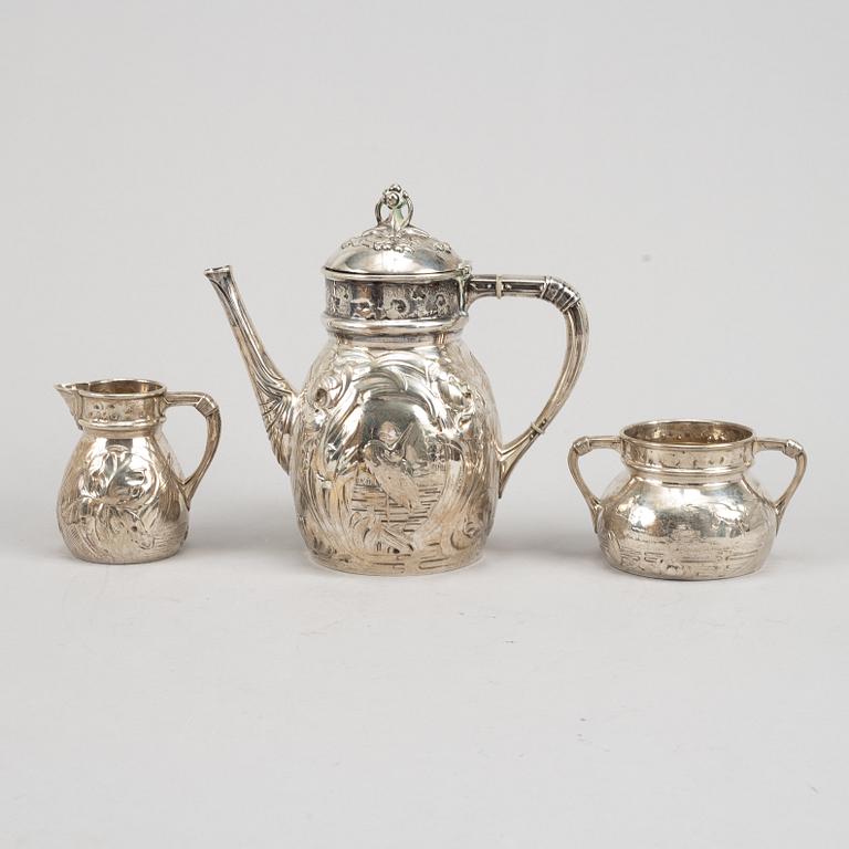 A Swedish silver coffee pot, creamer and sugar bowl, mark of Emil Oscar Möller, Malmö 1907.