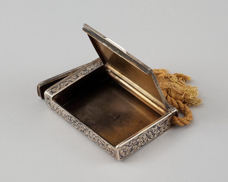 A Russian parcel-gilt and niello cigarette-case, unidentified makers mark, Moscow 1899-1908.