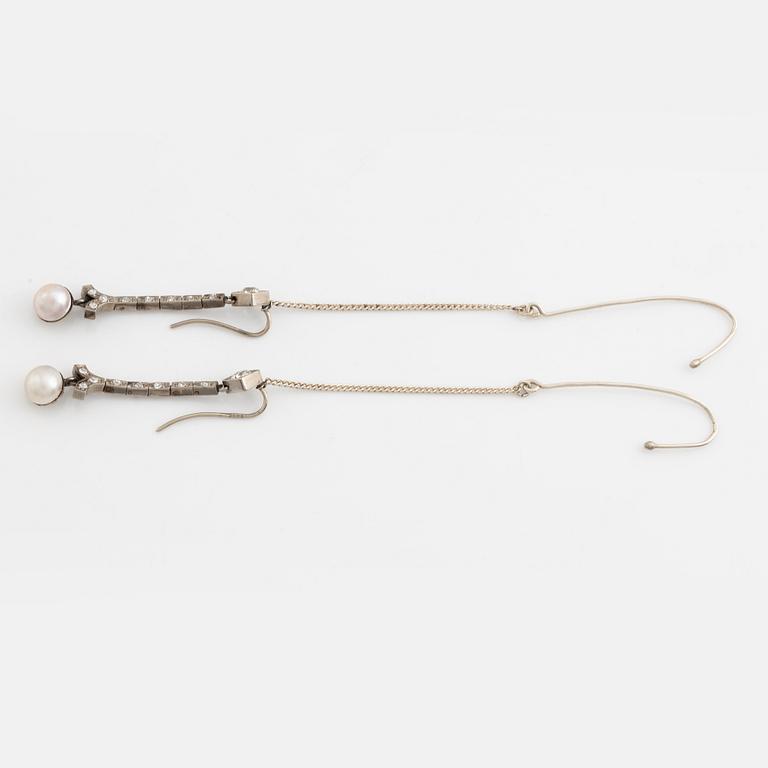 A pair of 18K gold and cultured halfpearl and diamond earrings.