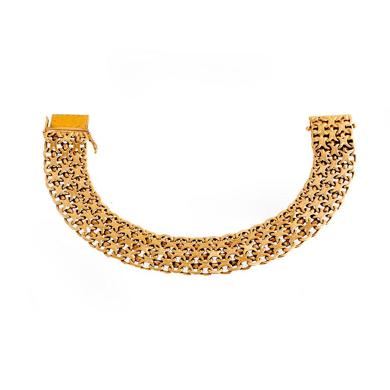 Armband 18K guld X-länk Stockholm 1962.