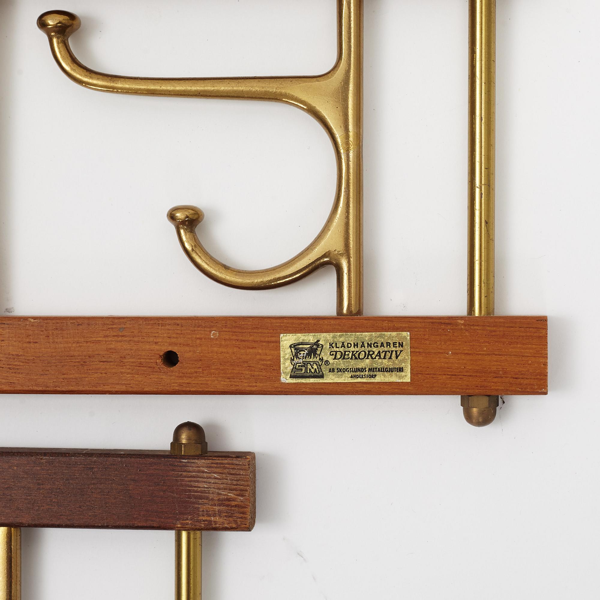 Two 'Dekorativ' coat hangers, Skogslunds metallgjuteri, Anderstorp, mid 20th Century.