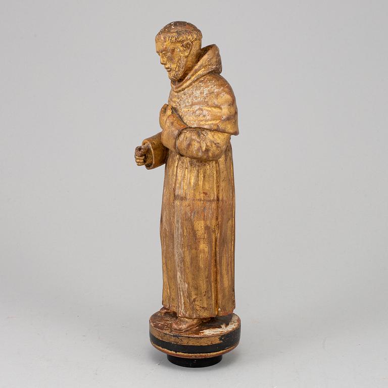 A carved wood sculpture, 18th/19th century.