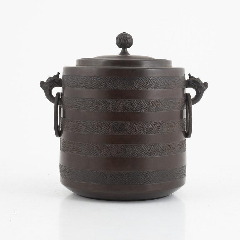 A Japanese bronze jar with cover, Meiji (1868-1912).