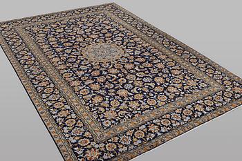 A carpet, Kashan, ca 348 x 237 cm.
