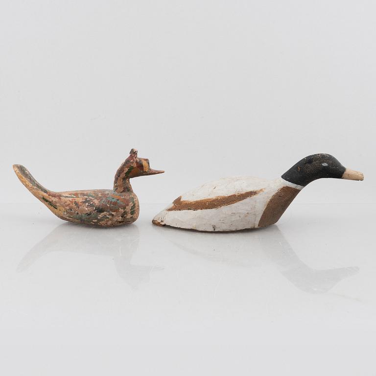 A set of six wooden duck decoys, 20th century.